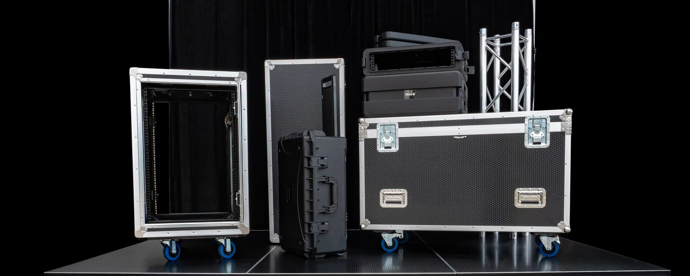 Road Cases, Hard Cases, and Truss atop a Titan AV Stage.