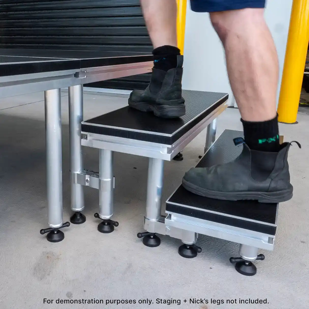 Person walks up 2 step Modular Stage Stairs