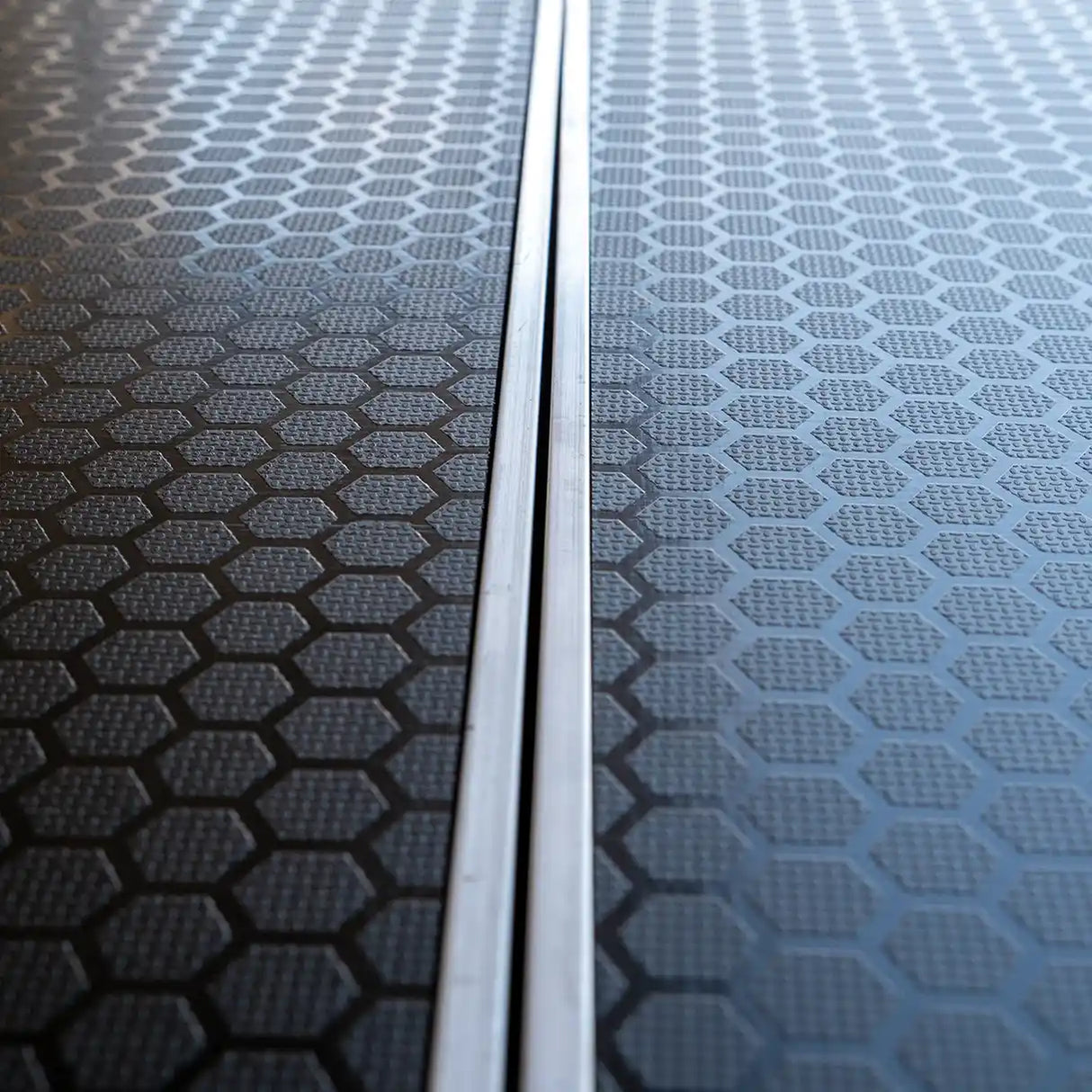 18mm hexapattern non-slip plywood and aluminium edging.